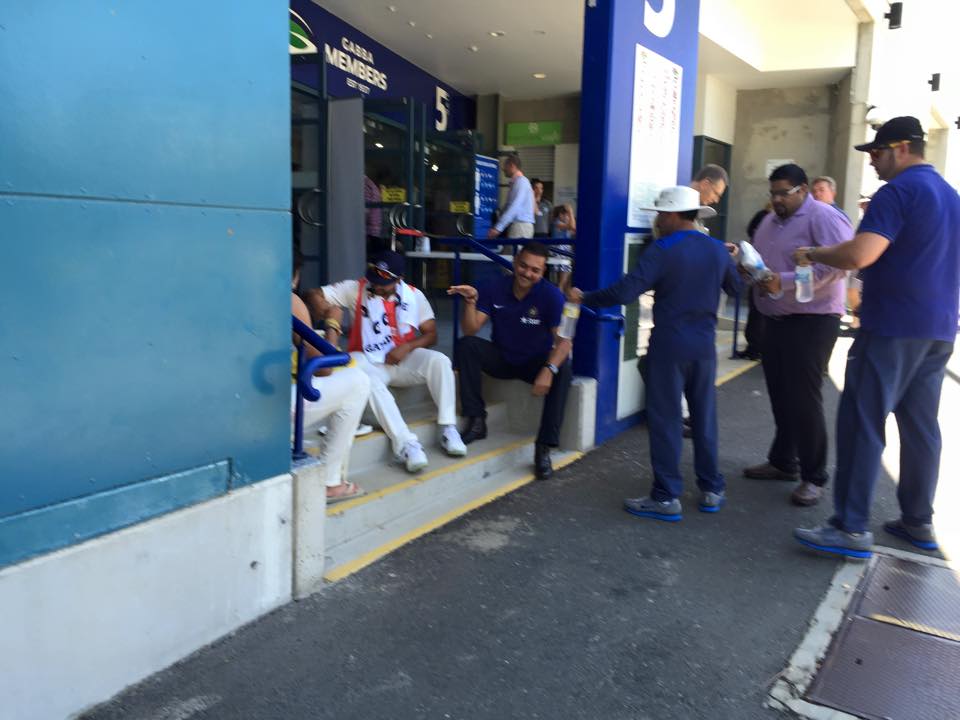 A photo obtained by the QT shows fast bowler Ishant Sharma, batsman Virat Kohli and Indian team director Ravi Shastri enjoying a meal on the street outside the ground. A photo obtained by the QT shows fast bowler Ishant Sharma, batsman Virat Kohli and Indian team director Ravi Shastri enjoying a meal on the street outside the ground.