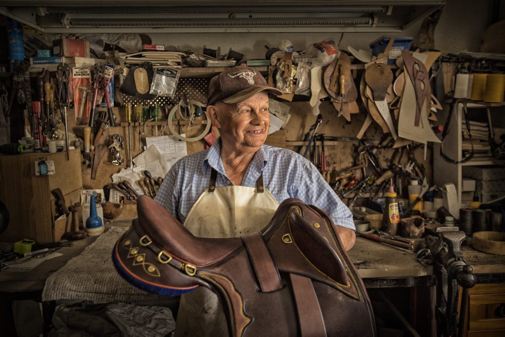 Warren Newcombe with one of his saddles in his South Grafton workshop Photo Adam Hourigan / The Daily Examiner Warren Newcombe with one of his saddles in his South Grafton workshop Photo Adam Hourigan / The Daily Examiner