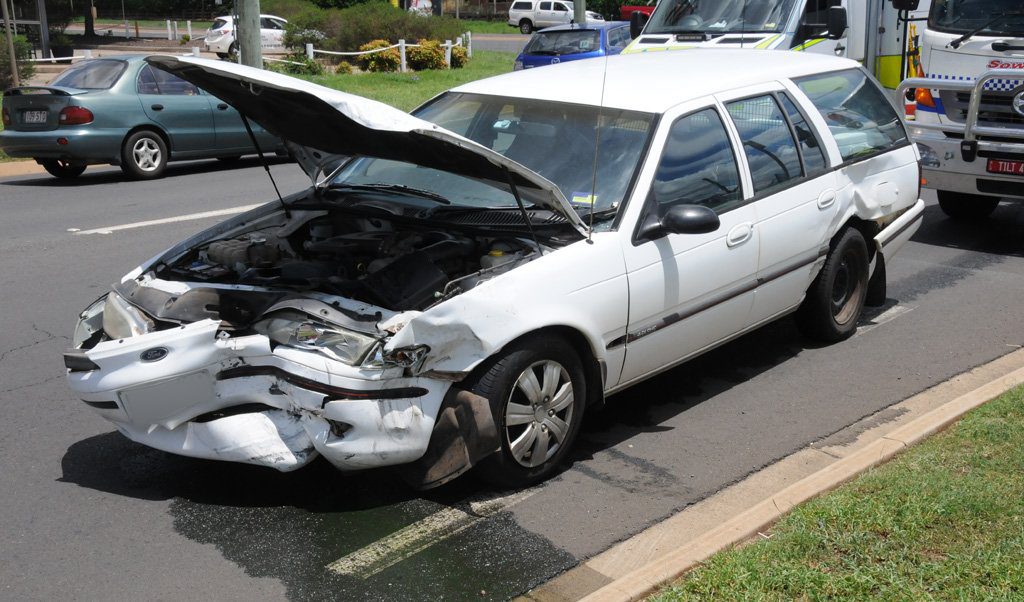 A Ford Falcon leaking oil following the crash. A Ford Falcon leaking oil following the crash.
