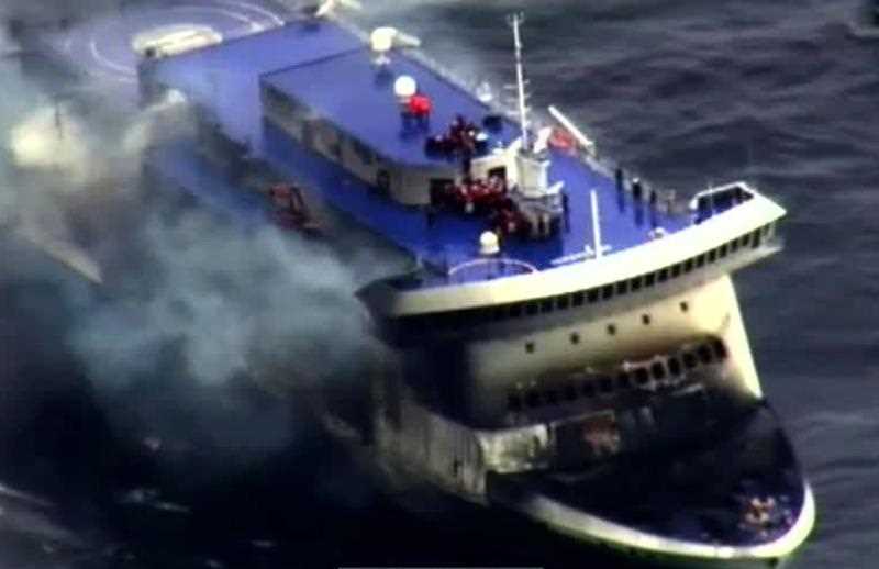 A photo grab taken from a video made available by the Guardia costiera, Italy's coast guard organization on December 28, 2014, shows the burning ferry A photo grab taken from a video made available by the Guardia costiera, Italy's coast guard organization on December 28, 2014, shows the burning ferry