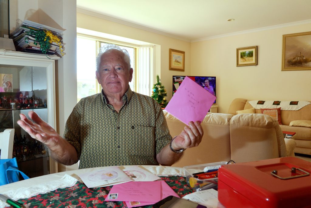 Image for sale: Caloundra resident Frank Goweris unhappy at the price increase in postage stamps. Photo: John McCutcheon / Sunshine Coast Daily
