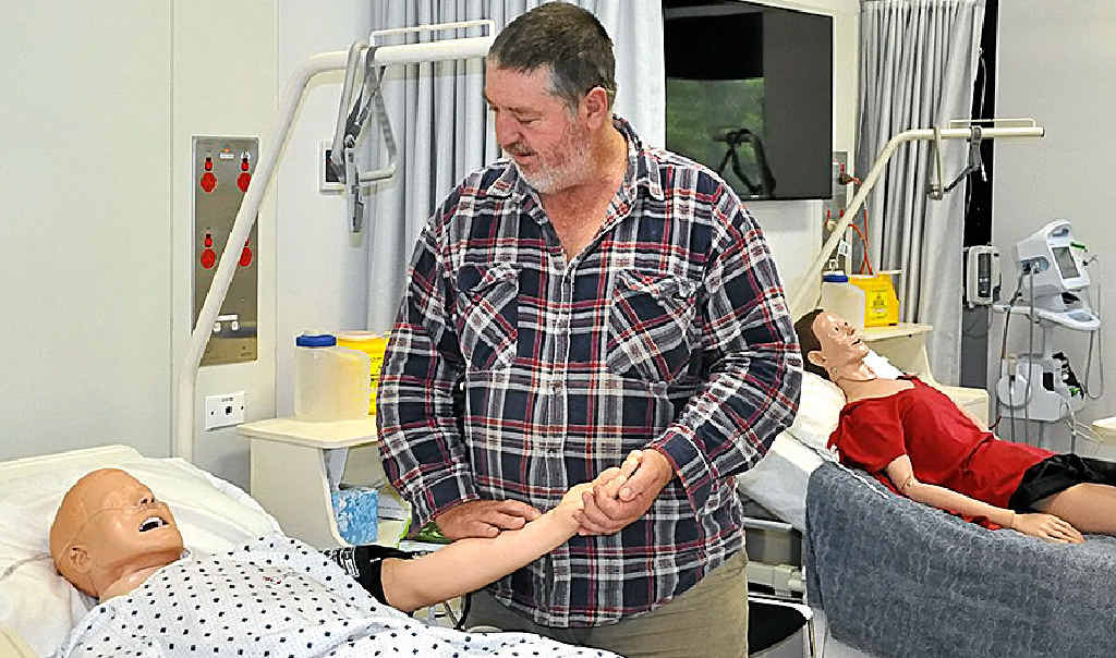 HELPING HAND: Nursing student Richard MacDonald. HELPING HAND: Nursing student Richard MacDonald.