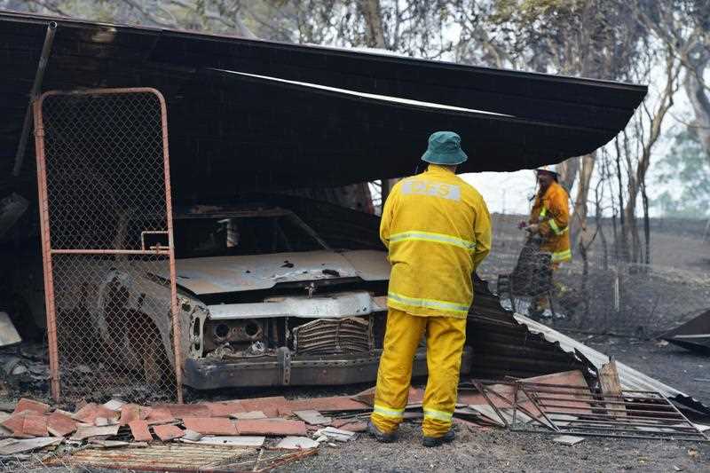 Country Fire Service volunteers work next to a burnt out shed near One Tree Hill in the Adelaide Hills, northeast of Adelaide on January 3, 2015. Houses were lost as an intense bushfire raged out of control in South Australia on on January 3, as authorities warned the state faced its worst wildfire danger since deadly 1983 blazes. Country Fire Service volunteers work next to a burnt out shed near One Tree Hill in the Adelaide Hills, northeast of Adelaide on January 3, 2015. Houses were lost as an intense bushfire raged out of control in South Australia on on January 3, as authorities warned the state faced its worst wildfire danger since deadly 1983 blazes.