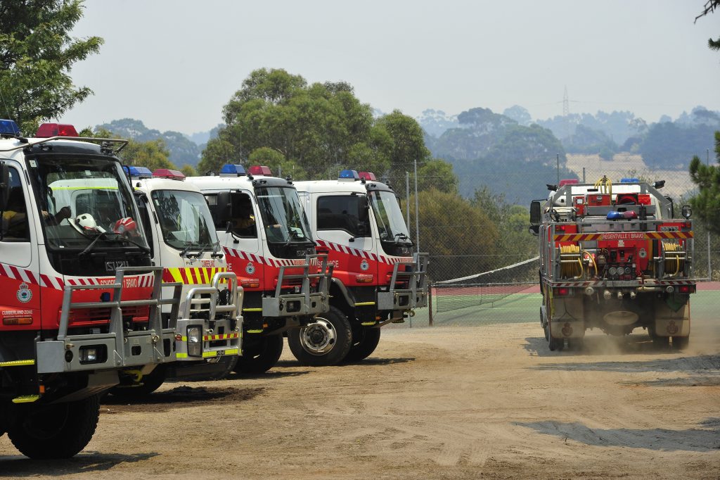 CFA staging area in One Tree Hill as fires continue to burn through the Adelaide Hills, Sunday, Jan. 4, 2015. (AAP Image/David Mariuz )No Archiving. CFA staging area in One Tree Hill as fires continue to burn through the Adelaide Hills, Sunday, Jan. 4, 2015. (AAP Image/David Mariuz )No Archiving.