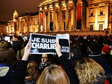 People take part in a vigil in Trafalgar Square, London, following the deadly terror attack on French satirical magazine Charlie Hebdo in Paris People take part in a vigil in Trafalgar Square, London, following the deadly terror attack on French satirical magazine Charlie Hebdo in Paris
