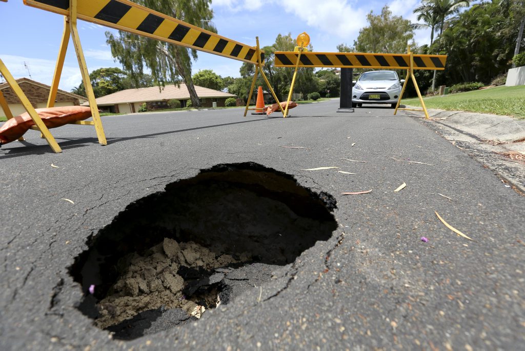 Sinkhole on the corner of Ash Dr and Paperbark ct at Banora Point. Photo: Nolan Verheij-Full / Tweed Daily News Sinkhole on the corner of Ash Dr and Paperbark ct at Banora Point. Photo: Nolan Verheij-Full / Tweed Daily News