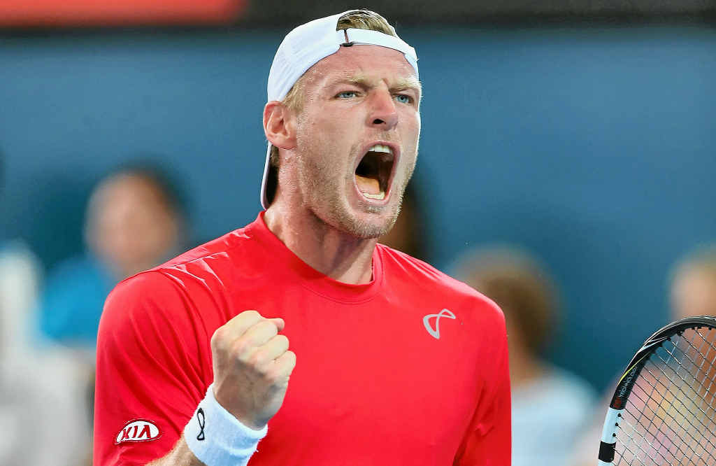 WINNING EFFORT: Sam Groth celebrates winning a point in his win over Lukasz Kubot of Poland at Brisbane yesterday. WINNING EFFORT: Sam Groth celebrates winning a point in his win over Lukasz Kubot of Poland at Brisbane yesterday.