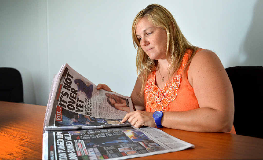 SHOCKING: Gympie’s Caroline Vielle looks over newspaper coverage of the string of terrorist attacks in Paris, France. SHOCKING: Gympie’s Caroline Vielle looks over newspaper coverage of the string of terrorist attacks in Paris, France.