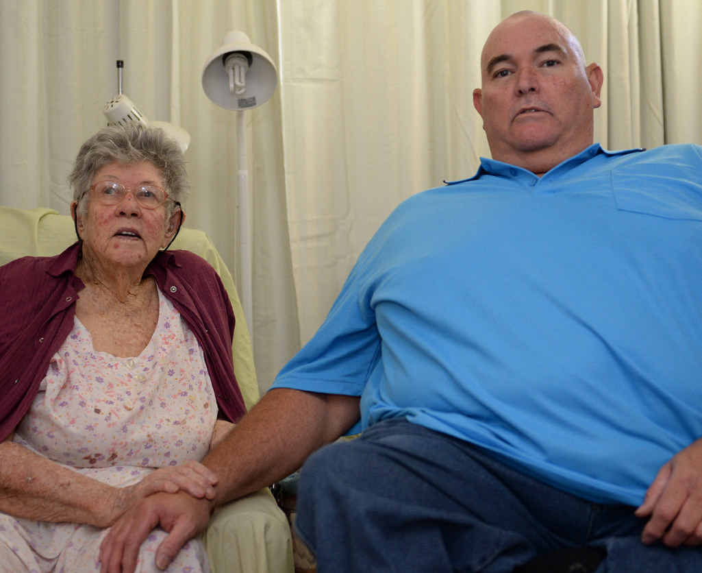 SIGN SADNESS: Rockhampton’s Olive Jones and her son Bill Jones want their sign back. INSET: The sign hung at the Thozet Rd residence. SIGN SADNESS: Rockhampton’s Olive Jones and her son Bill Jones want their sign back. INSET: The sign hung at the Thozet Rd residence.