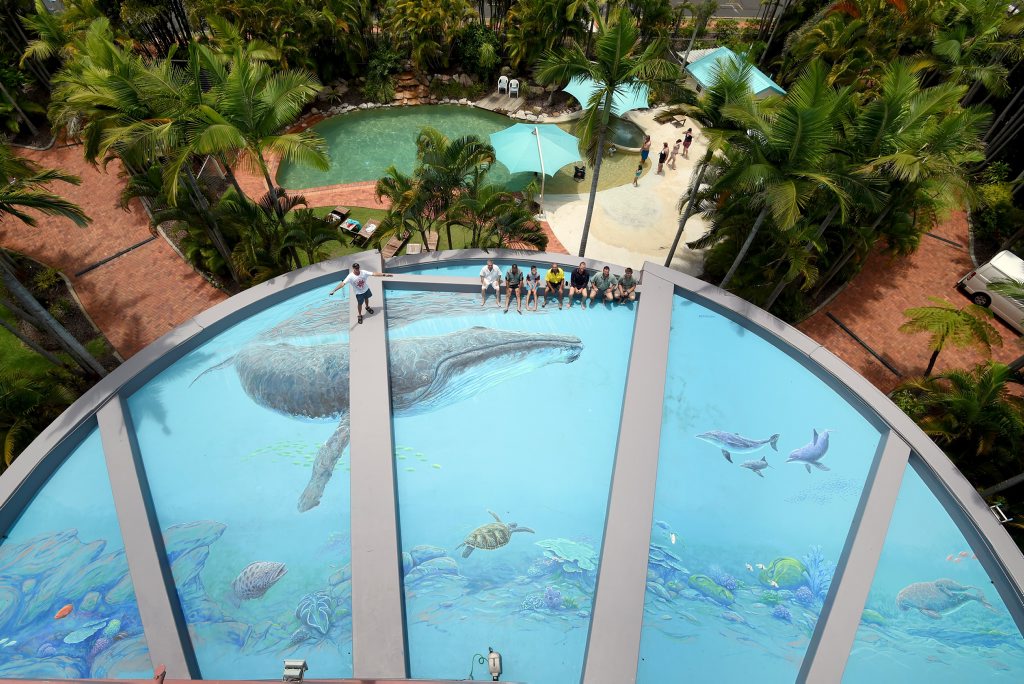 Artist Paul Pettersson, manager Brian Beynon, Andrew Lindsay, Kalam Lindsay, Bernie O'Sullivan, Heath Wilson, Glen Darlington and Blake Darlington with the Riviera Resort's rooftop mural. Artist Paul Pettersson, manager Brian Beynon, Andrew Lindsay, Kalam Lindsay, Bernie O'Sullivan, Heath Wilson, Glen Darlington and Blake Darlington with the Riviera Resort's rooftop mural.