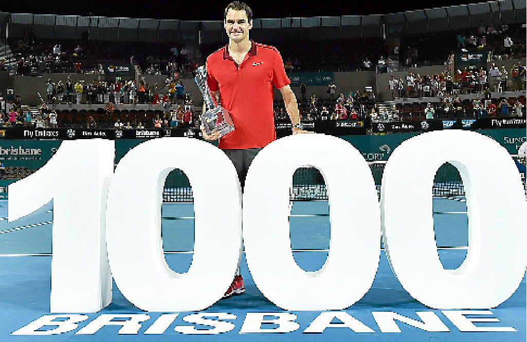 TOP OF THE PILE: Roger Federer celebrates the 1000th victory of his career after winning the Brisbane International. TOP OF THE PILE: Roger Federer celebrates the 1000th victory of his career after winning the Brisbane International.