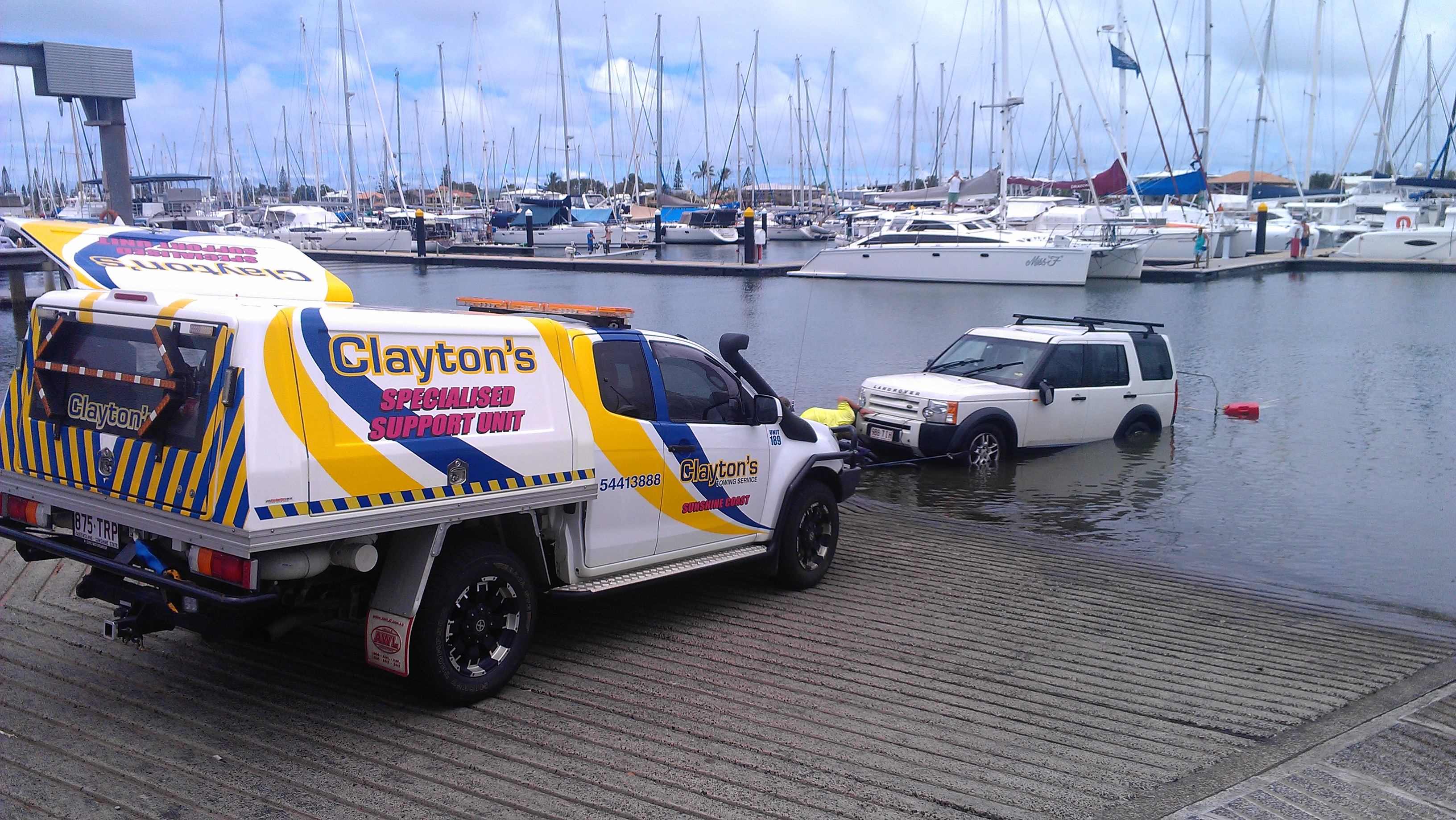 WATCH Car and trailer drive off boat ramp at Mooloolaba Sunshine