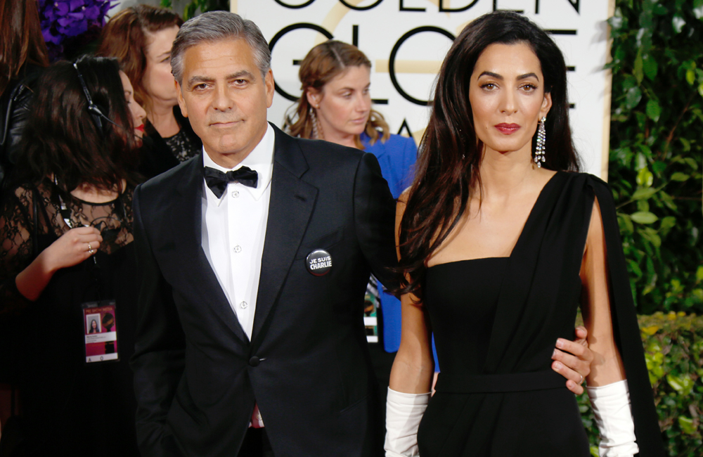 George Clooney and his new wife Amal at the Golden Globes. George Clooney and his new wife Amal at the Golden Globes.