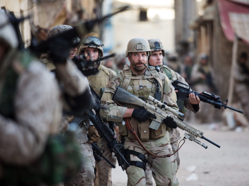 Bradley Cooper in a scene from American Sniper. Bradley Cooper in a scene from American Sniper.