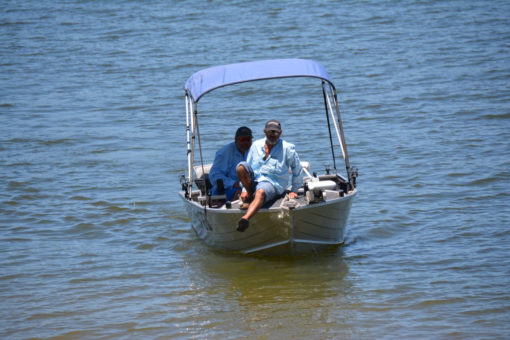 Two fisherman return from their morning efforts.