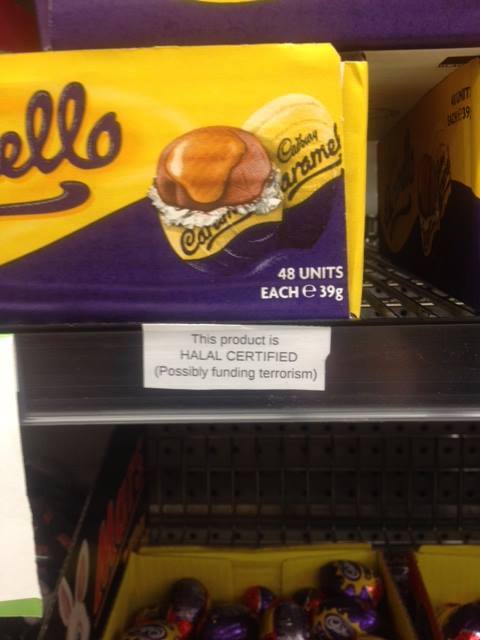 Stickers reportedly posted on Woolworths products. Stickers reportedly posted on Woolworths products.