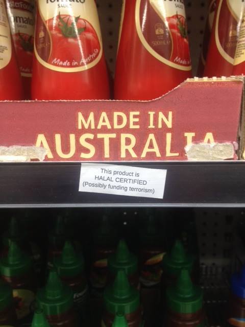 Stickers reportedly posted on Woolworths products. Stickers reportedly posted on Woolworths products.