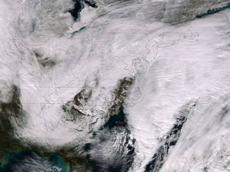 A satellite photograph shows a major winter storm bringing snow to the Northeast of the US A satellite photograph shows a major winter storm bringing snow to the Northeast of the US
