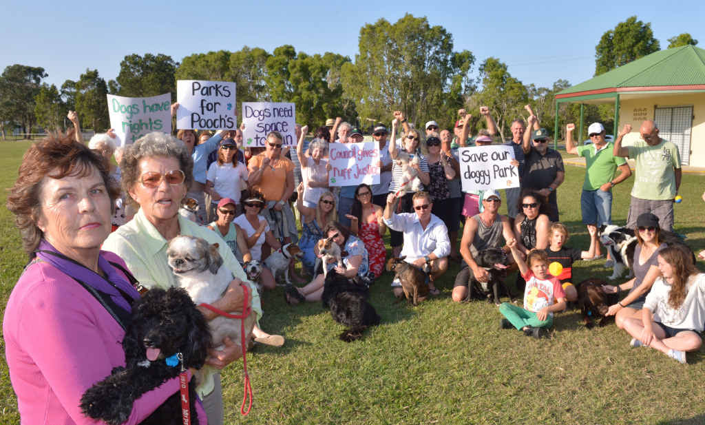 RESIDENTS UNITE: Dorothy Letters with Winston, Helle Strath with Lucky and other users of Grahame Stewart Park in Currimundi are angry that the council may prevent their dogs from running free there. RESIDENTS UNITE: Dorothy Letters with Winston, Helle Strath with Lucky and other users of Grahame Stewart Park in Currimundi are angry that the council may prevent their dogs from running free there.