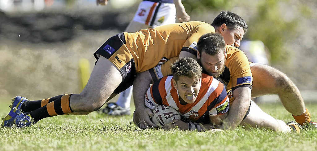 BOUND TO RISE: The Roosters’ Lewis Prizeman feels the weight of Wallaby defenders, but his club is determined it will not be held down. BOUND TO RISE: The Roosters’ Lewis Prizeman feels the weight of Wallaby defenders, but his club is determined it will not be held down.