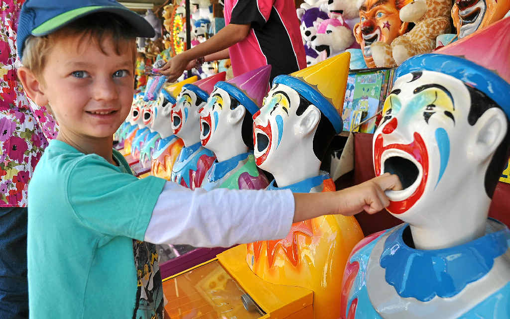 SHOW TIME: Stanthorpe is ready to put on a stellar show this weekend. Pictured is Jarrah McCarthy trying his luck on the clowns at last year’s show. SHOW TIME: Stanthorpe is ready to put on a stellar show this weekend. Pictured is Jarrah McCarthy trying his luck on the clowns at last year’s show.
