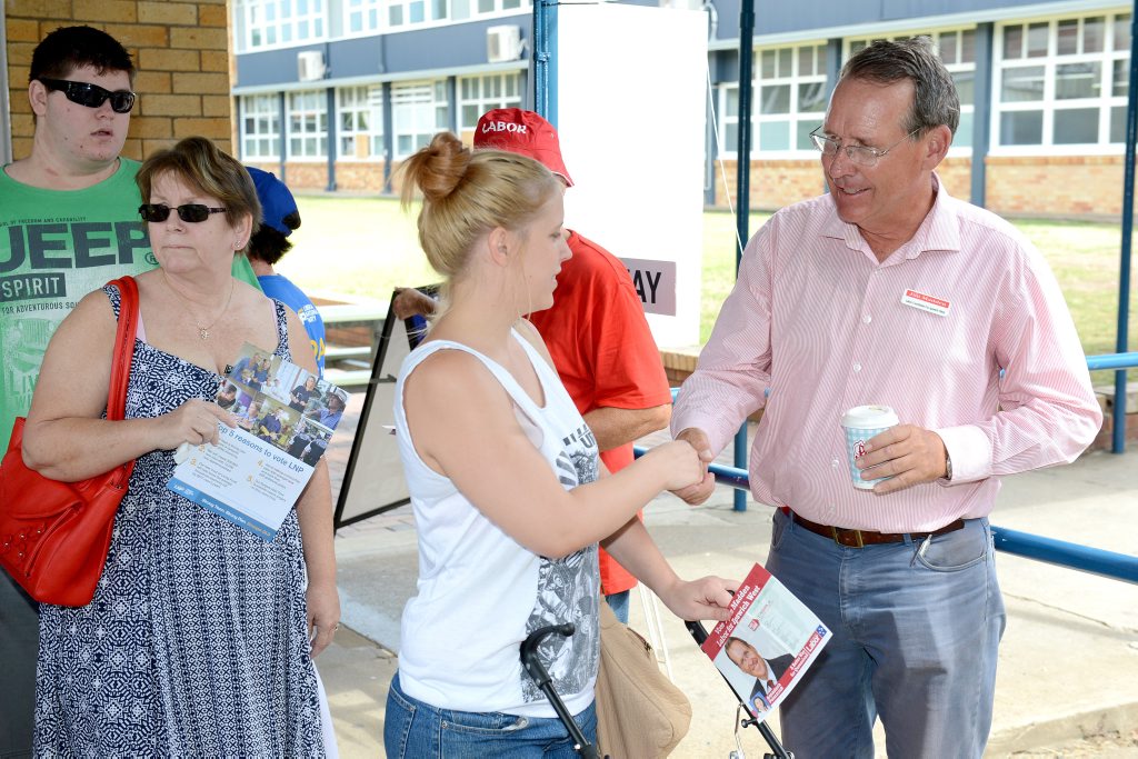 Polling Booths on Election day: Labour candidate Jim Madden talks to voters at Ipswich State High. Polling Booths on Election day: Labour candidate Jim Madden talks to voters at Ipswich State High.
