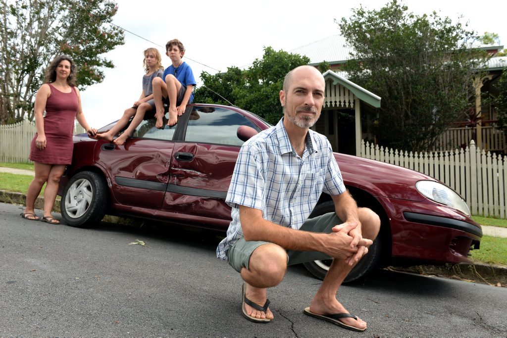 Jane, Josie, Mitchell and Daniel Hawkins with their smashed car. Photo: John Gass / Tweed Daily News Jane, Josie, Mitchell and Daniel Hawkins with their smashed car. Photo: John Gass / Tweed Daily News