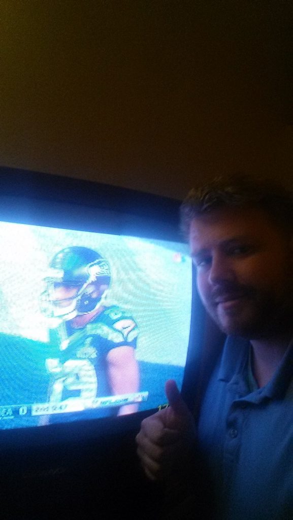 Jonathon Hogan watches the Super Bowl from his motel room. Jonathon Hogan watches the Super Bowl from his motel room.