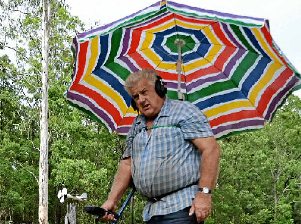 IDEAS MAN: Adrian Hastie of Coombell shows off his no-hands umbrella. IDEAS MAN: Adrian Hastie of Coombell shows off his no-hands umbrella.
