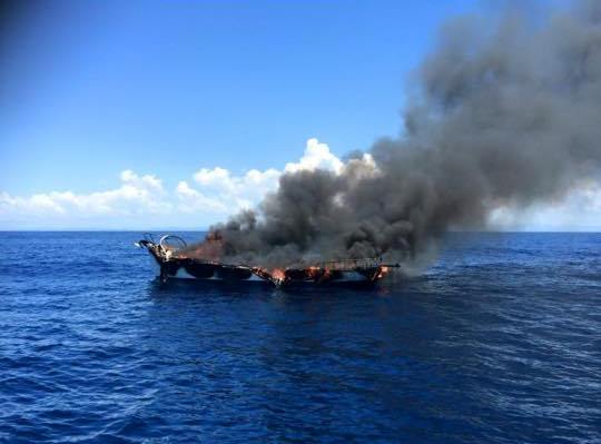 A yacht was destroyed by fire offshore on Sunday. A yacht was destroyed by fire offshore on Sunday.
