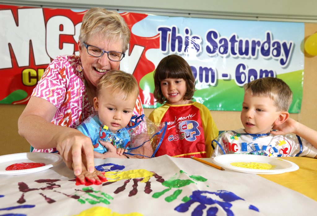 Janie French helping the Baines kids Asher, Indiara and Bryn with some hand painting at the Messy Church in Banora. Photo: Nolan Verheij-Full / Tweed Daily News Janie French helping the Baines kids Asher, Indiara and Bryn with some hand painting at the Messy Church in Banora. Photo: Nolan Verheij-Full / Tweed Daily News
