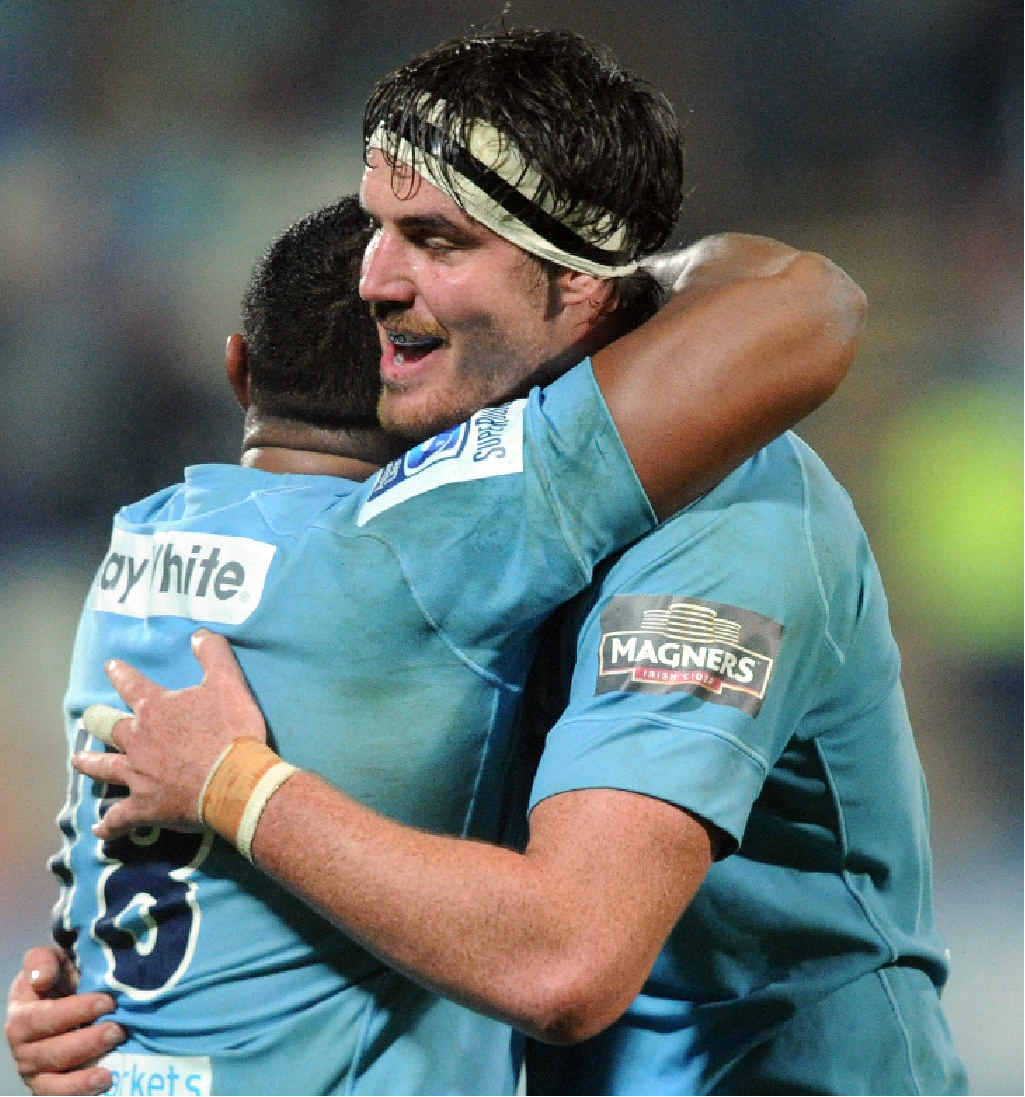 COME BACK: Kane Douglas embraces Sekope Kepu as they celebrate a win during the 2014 Super Rugby season. PHOTO: AAP/NZN IMAGE/SNPA, ROSS SETFORD COME BACK: Kane Douglas embraces Sekope Kepu as they celebrate a win during the 2014 Super Rugby season. PHOTO: AAP/NZN IMAGE/SNPA, ROSS SETFORD