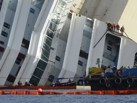 The Costa Concordia while it was lying on its side. The Costa Concordia while it was lying on its side.