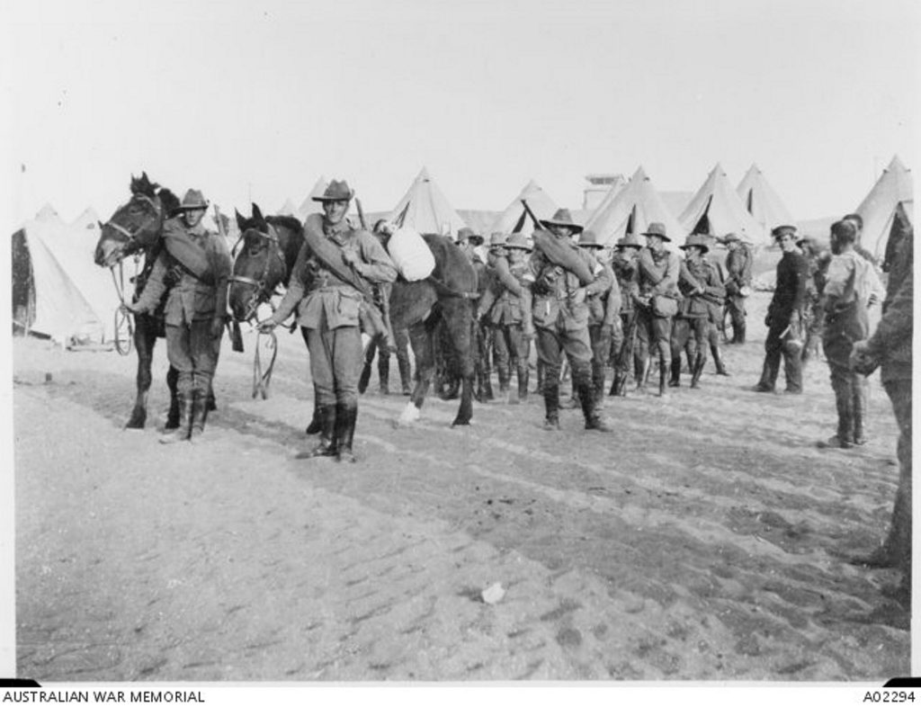 Members of the 1st Australian Division Signal Company, attached to the 3rd Infantry Brigade, prepare to leave Mena Camp in Egypt to embark for Lemnos Island. Members of the 1st Australian Division Signal Company, attached to the 3rd Infantry Brigade, prepare to leave Mena Camp in Egypt to embark for Lemnos Island.