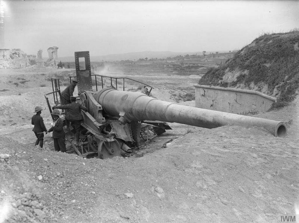British soldiers examine a 9.4-inch coastal defence gun at a fort on Cape Helles, at the foot of the Gallipoli Peninsula, after a direct hit from one of the ships of the February naval assult. British soldiers examine a 9.4-inch coastal defence gun at a fort on Cape Helles, at the foot of the Gallipoli Peninsula, after a direct hit from one of the ships of the February naval assult.
