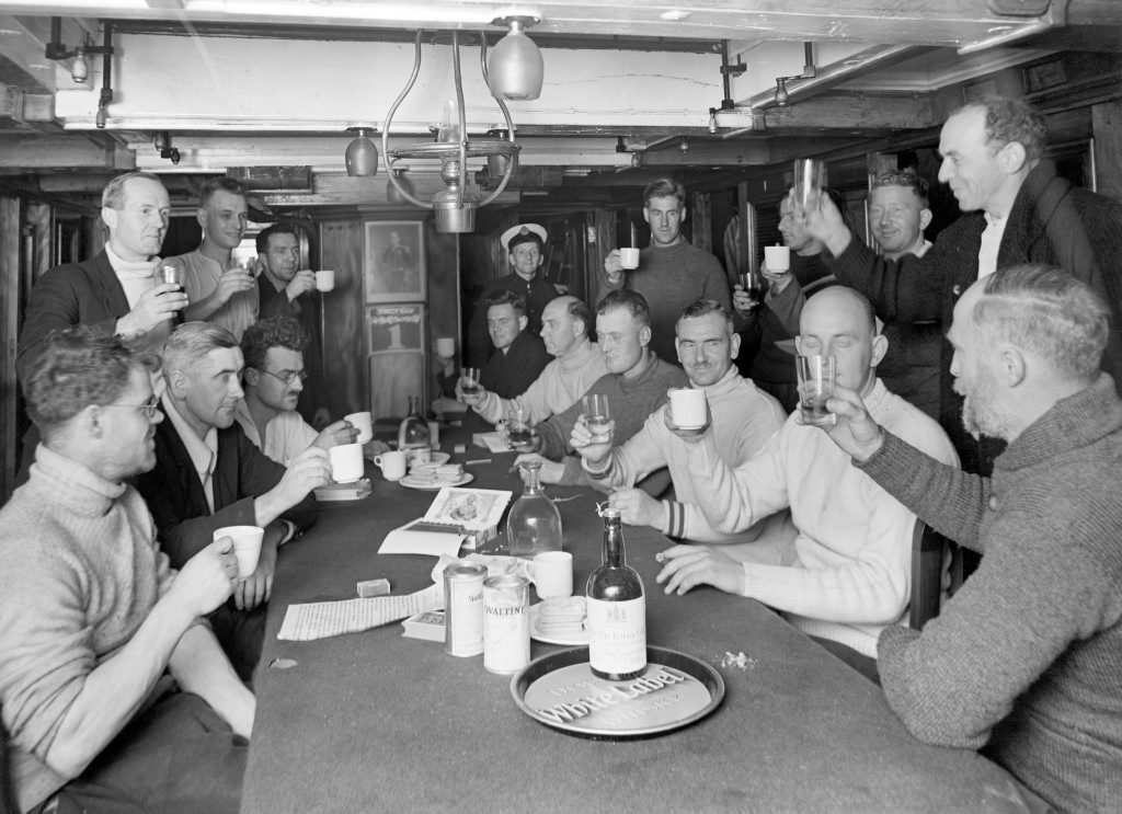 To our next meeting. On board the Discovery, c.1931. Photographer: Frank Hurley. NAA: A461, D413/2 National Archives collection To our next meeting. On board the Discovery, c.1931. Photographer: Frank Hurley. NAA: A461, D413/2 National Archives collection