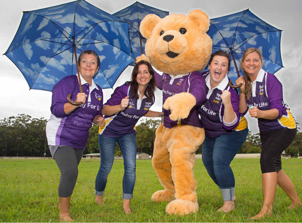 COMBATING CANCER: Relay For Life organisers Vanessa Smith, Katie Rademaker, Ashleigh Bialic and Pippa Tabone with mascot Dougal Bear at the Coffs Harbour Showground, where this year’s event will take place. COMBATING CANCER: Relay For Life organisers Vanessa Smith, Katie Rademaker, Ashleigh Bialic and Pippa Tabone with mascot Dougal Bear at the Coffs Harbour Showground, where this year’s event will take place.