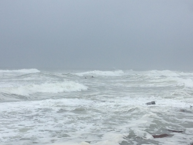 Surfers at Yaroomba despite dangerous conditions and closed beaches. Surfers at Yaroomba despite dangerous conditions and closed beaches.