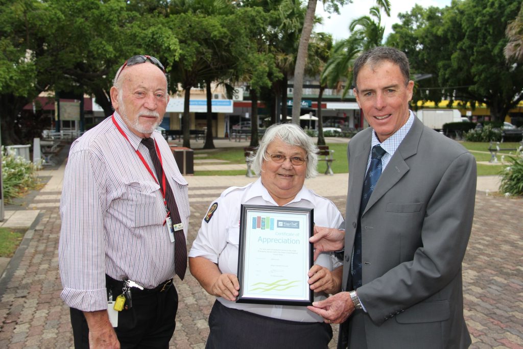 Fraser Coast disaster co-ordinator Mal Churchill and Fraser Coast Mayor Gerard O'Connell present Maryborough SES group leader Helen Scott with a community achievment award. Fraser Coast disaster co-ordinator Mal Churchill and Fraser Coast Mayor Gerard O'Connell present Maryborough SES group leader Helen Scott with a community achievment award.