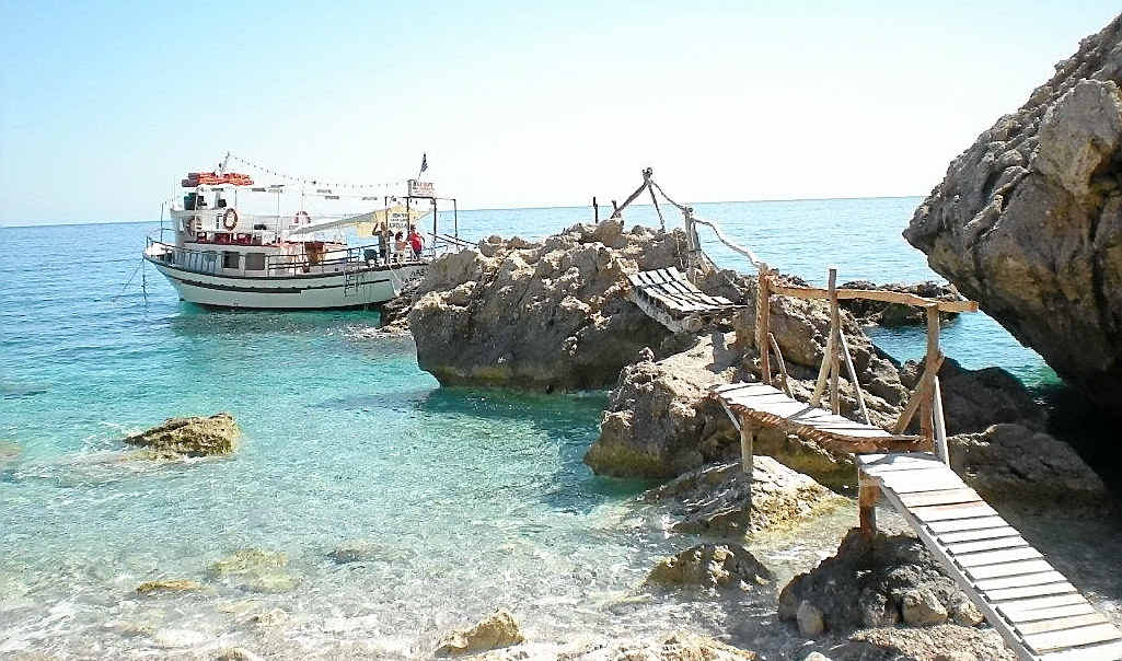 Take The Love Boat cruise around the island of Karpathos for a rustic experience. TOP RIGHT: Discover a forgotten world at Olympos where bent women keep tradition. Take The Love Boat cruise around the island of Karpathos for a rustic experience. TOP RIGHT: Discover a forgotten world at Olympos where bent women keep tradition.