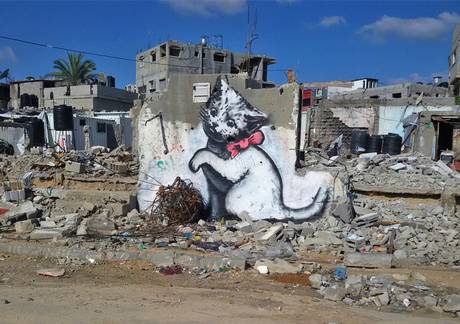 Banksy's stencil art of a giant cat appears among rubble in Gaza. He said he wanted to draw attention to the destruction in Gaza Banksy's stencil art of a giant cat appears among rubble in Gaza. He said he wanted to draw attention to the destruction in Gaza