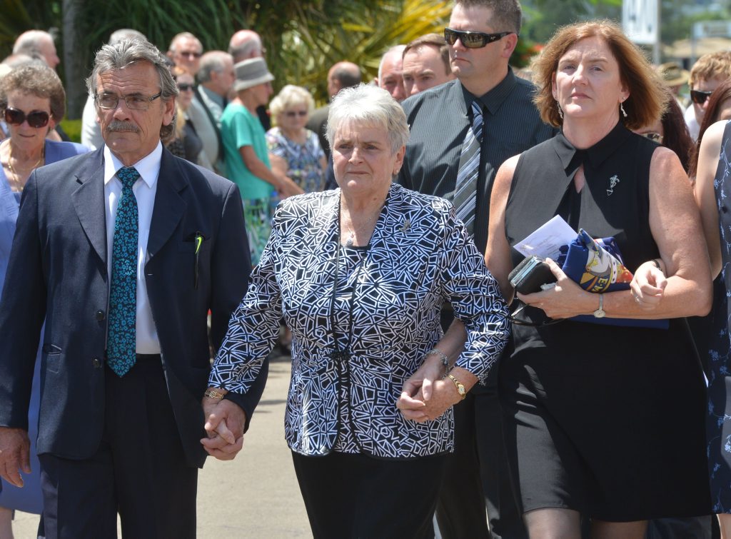 SAD DAY: Dulcie Dyne is comforted by firends and family as she walks behind her husband's hearse. SAD DAY: Dulcie Dyne is comforted by firends and family as she walks behind her husband's hearse.