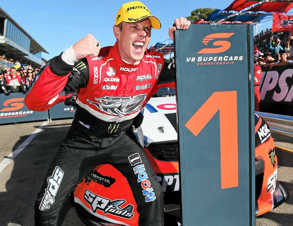ALL SMILES: James Courtney celebrates after winning race three at the Clipsal 500. ALL SMILES: James Courtney celebrates after winning race three at the Clipsal 500.