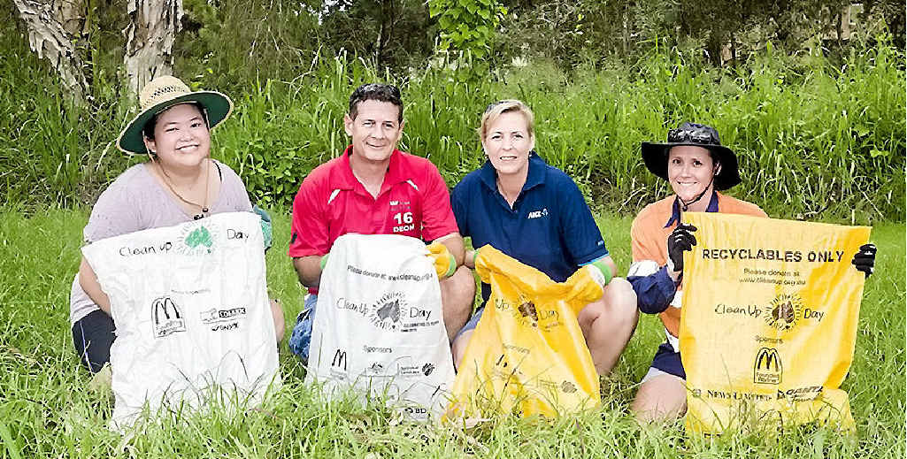 BIG EFFORT: Andrea Cortez, Deon Richardson, Allison Ingham and Miranda Gallaghan clean up Police Creek in Gladstone during Clean Up Australia Day. BIG EFFORT: Andrea Cortez, Deon Richardson, Allison Ingham and Miranda Gallaghan clean up Police Creek in Gladstone during Clean Up Australia Day.