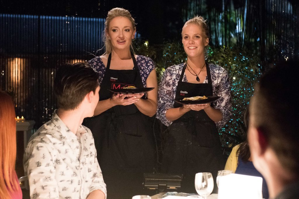 Sheri and Emilie serve their entree during their second Sheri and Emilie serve their entree during their second