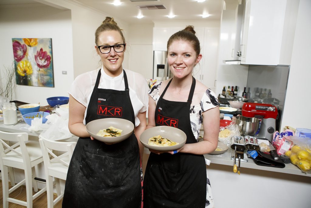 Emma and Jane prepare to serve their entree during their instant restaurant redemption. Emma and Jane prepare to serve their entree during their instant restaurant redemption.