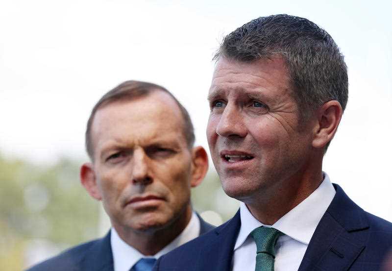 Australian Prime Minister Tony Abbott with NSW Premier Mike Baird at a press conference to mark beginning of the Westconnex construction in Sydney, Sunday, Mar. 8, 2015. Australian Prime Minister Tony Abbott with NSW Premier Mike Baird at a press conference to mark beginning of the Westconnex construction in Sydney, Sunday, Mar. 8, 2015.