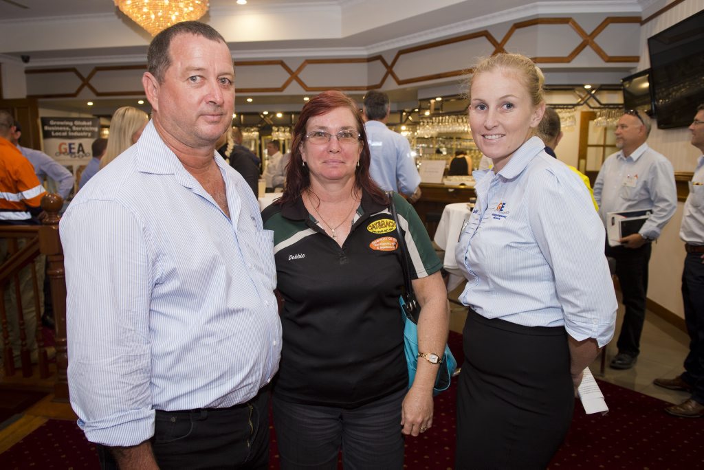 Graham and Debbie Fitzsimon from Excavators On Site and Carli Hobbs from Gladstone Engineering Alliance. Graham and Debbie Fitzsimon from Excavators On Site and Carli Hobbs from Gladstone Engineering Alliance.