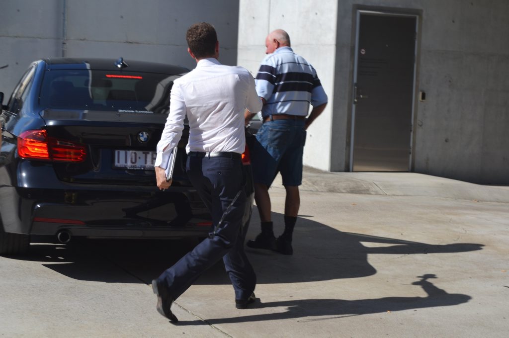Tom Noble rushes from waiting media after appearing in Ipswich Magistrates court on Tuesday. Tom Noble rushes from waiting media after appearing in Ipswich Magistrates court on Tuesday.