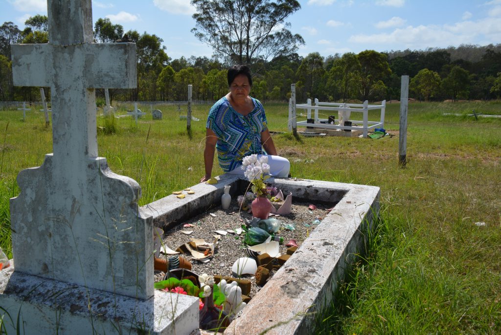 HEARTLESS ACT: Colleen Hurley found her mother's grave destroyed by vandals. HEARTLESS ACT: Colleen Hurley found her mother's grave destroyed by vandals.